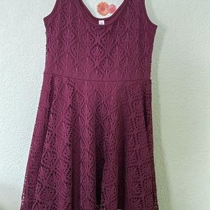 Maroon crochet-like lace dress.